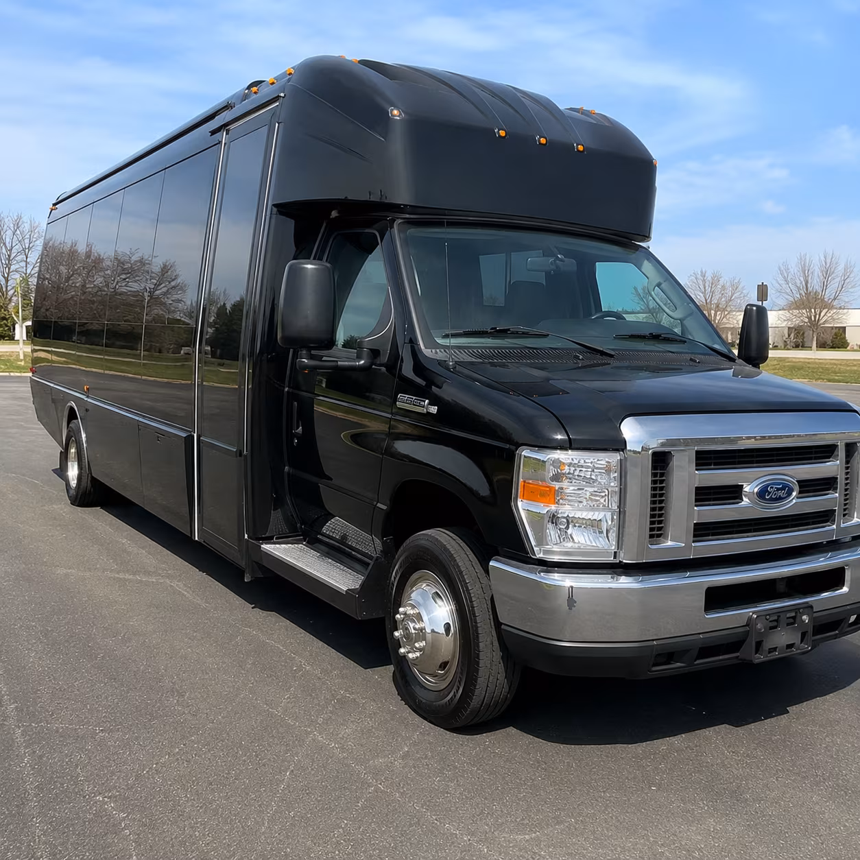 Friends laughing during a party bus celebration in Great Falls